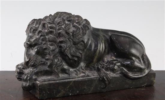 After Canova. A green serpentine marble statue of a recumbent lion 8.5in.